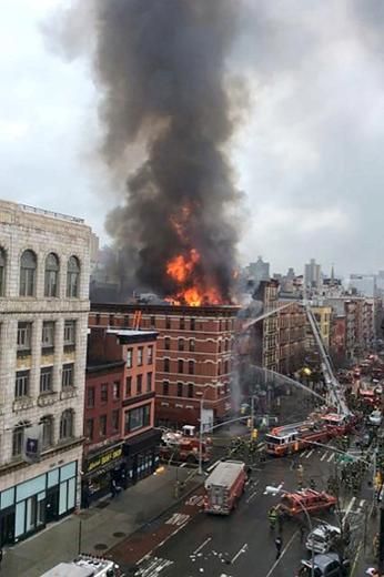 New York apartment buildings collapse in massive gas blast More than 250 firefighters were called to deal with a huge blaze which destroyed three apartment buildings in New York’s East Village,